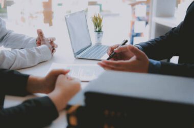 consulting lawyer insurance broker consulting giving legal advice to couple customer about buying renting house. financial advisor with mortgage loan investment contract. Real Estate Agent selling real estate property